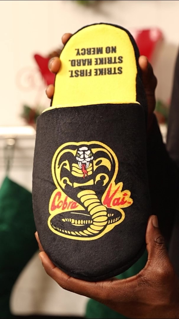 Whether you're a die-hard fan of the Cobra Kai dojo or simply someone who appreciates ultimate comfort, these exclusive Cobra Kai Slip-On Slippers for Adults are the perfect addition to your wardrobe.